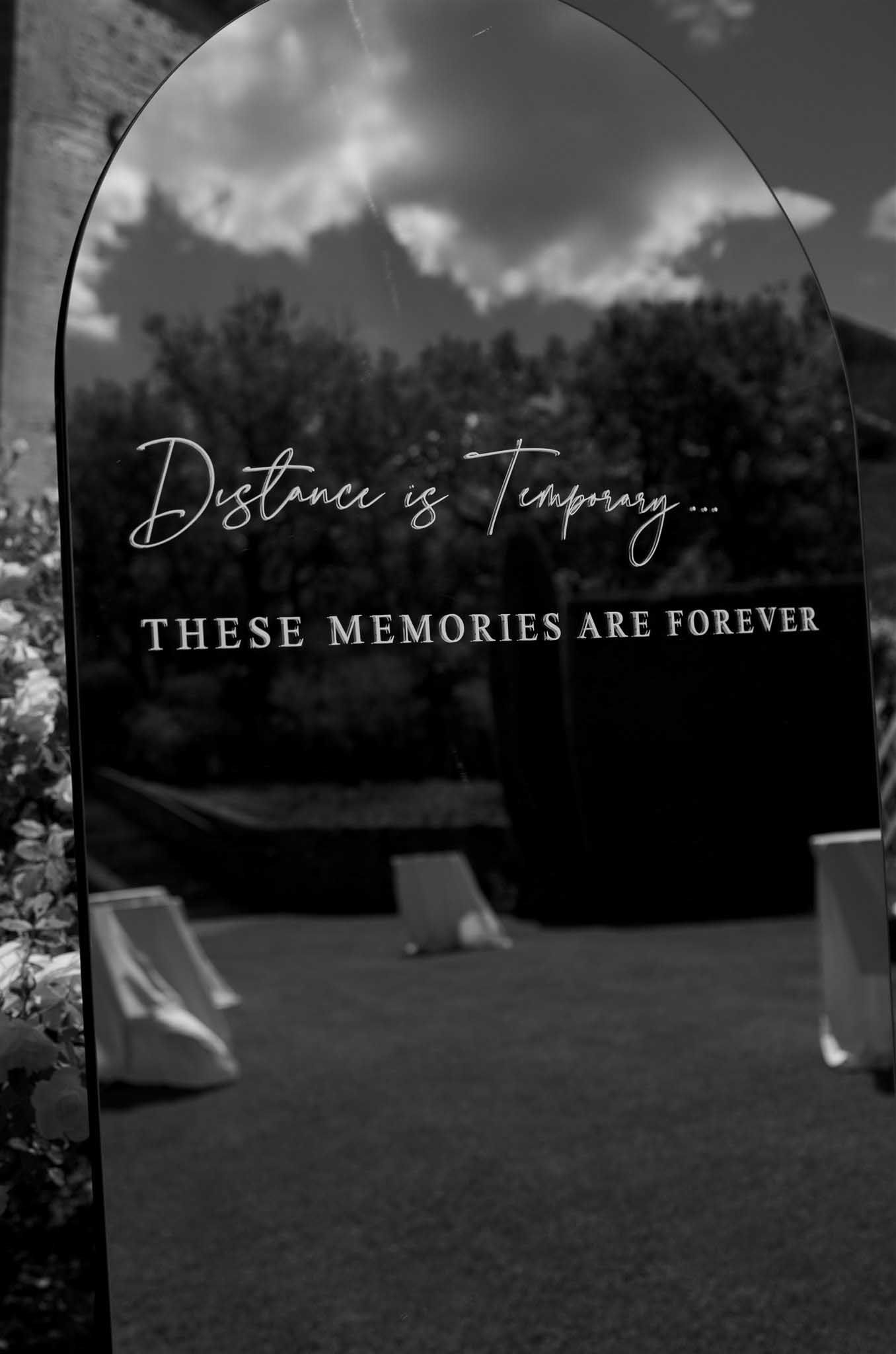 Black and white mirror signage adds timeless wedding touch