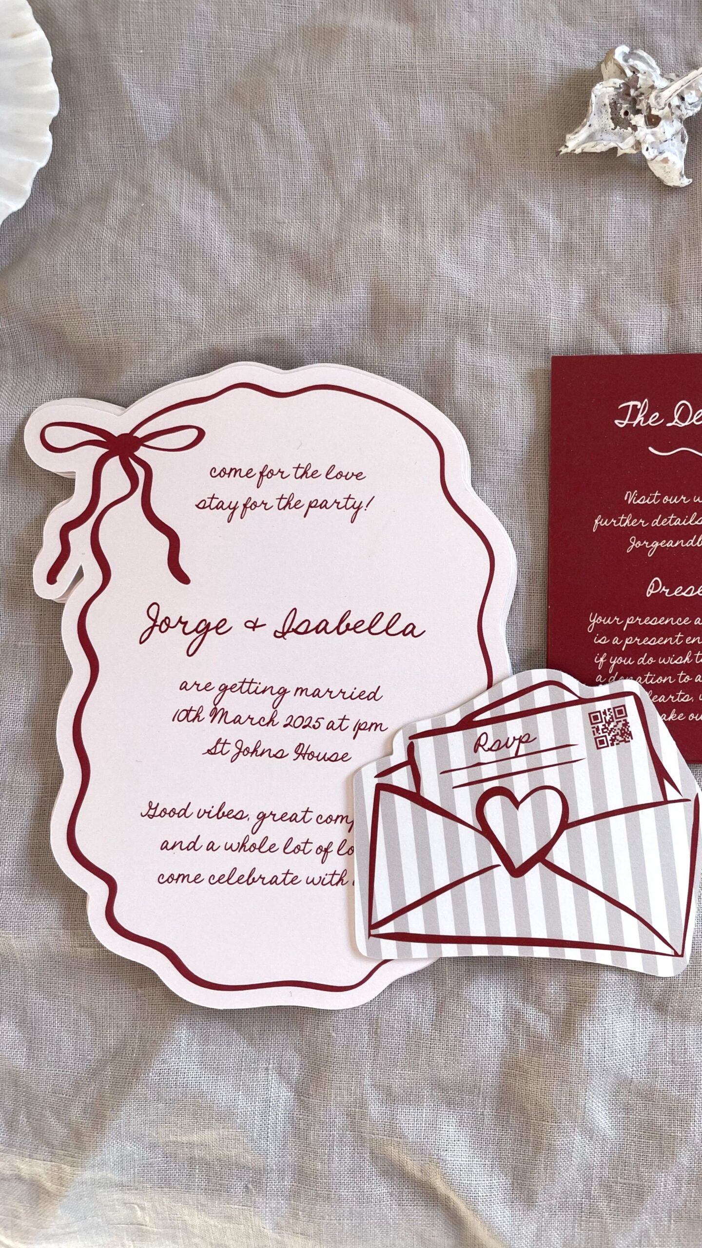 Deep red and pink wavy shape hand drawn bow wedding invitation