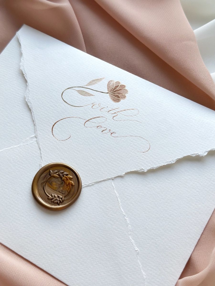Handmade envelope with watercolor flowers. Modern calligraphy writing