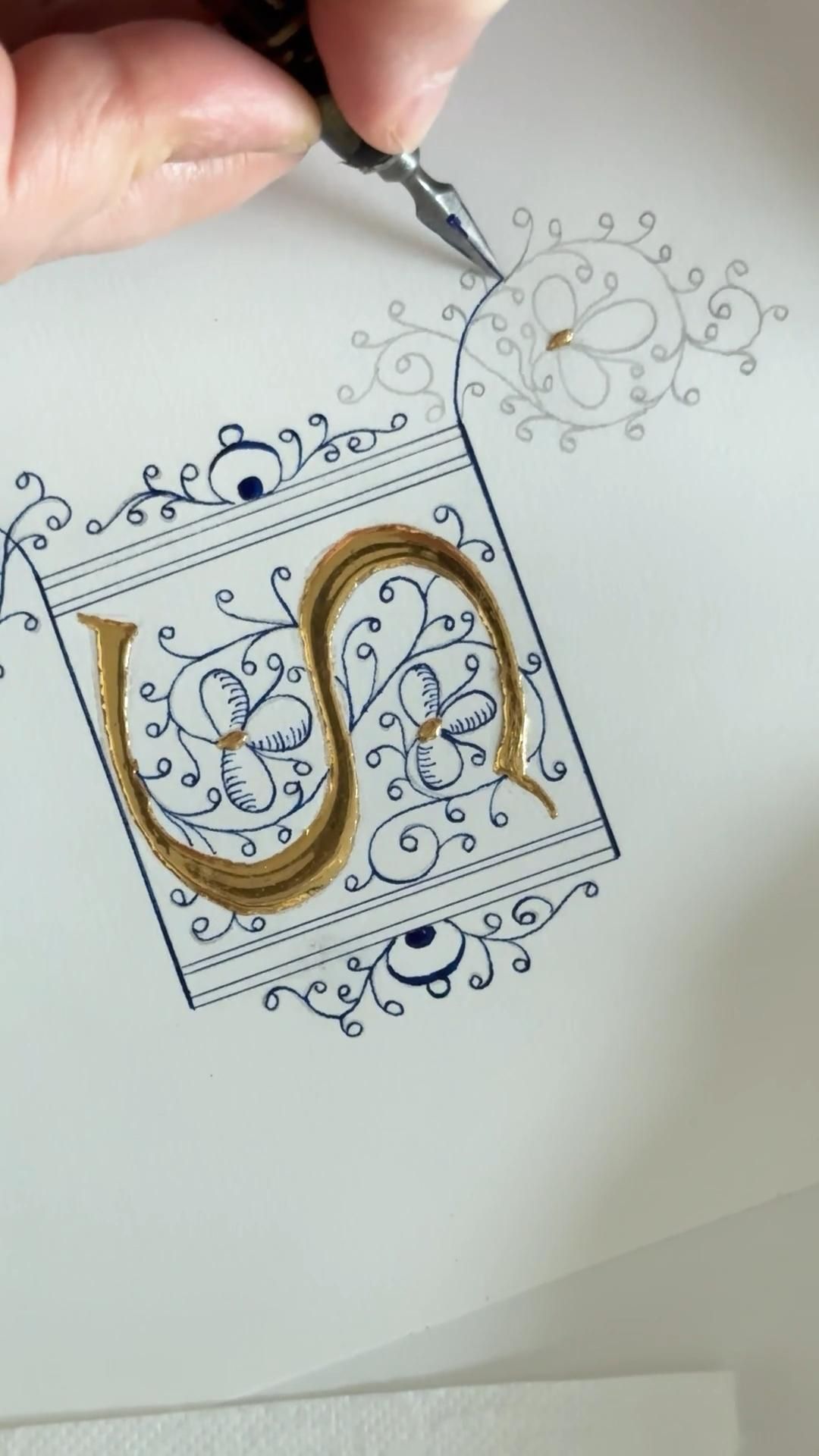 Illuminated letter and gilding