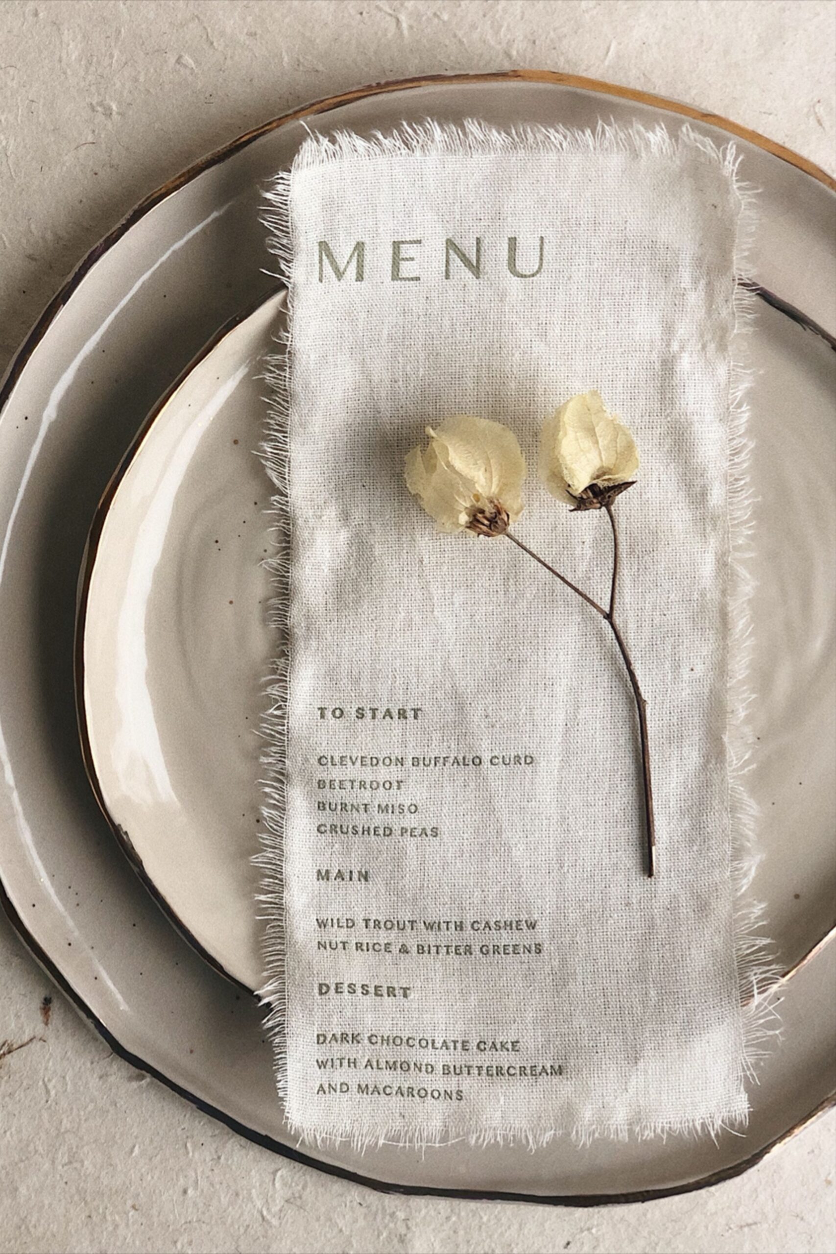 Letterpress printed linen menu with raw edges for a natural, yet refined look. For a modern wedding