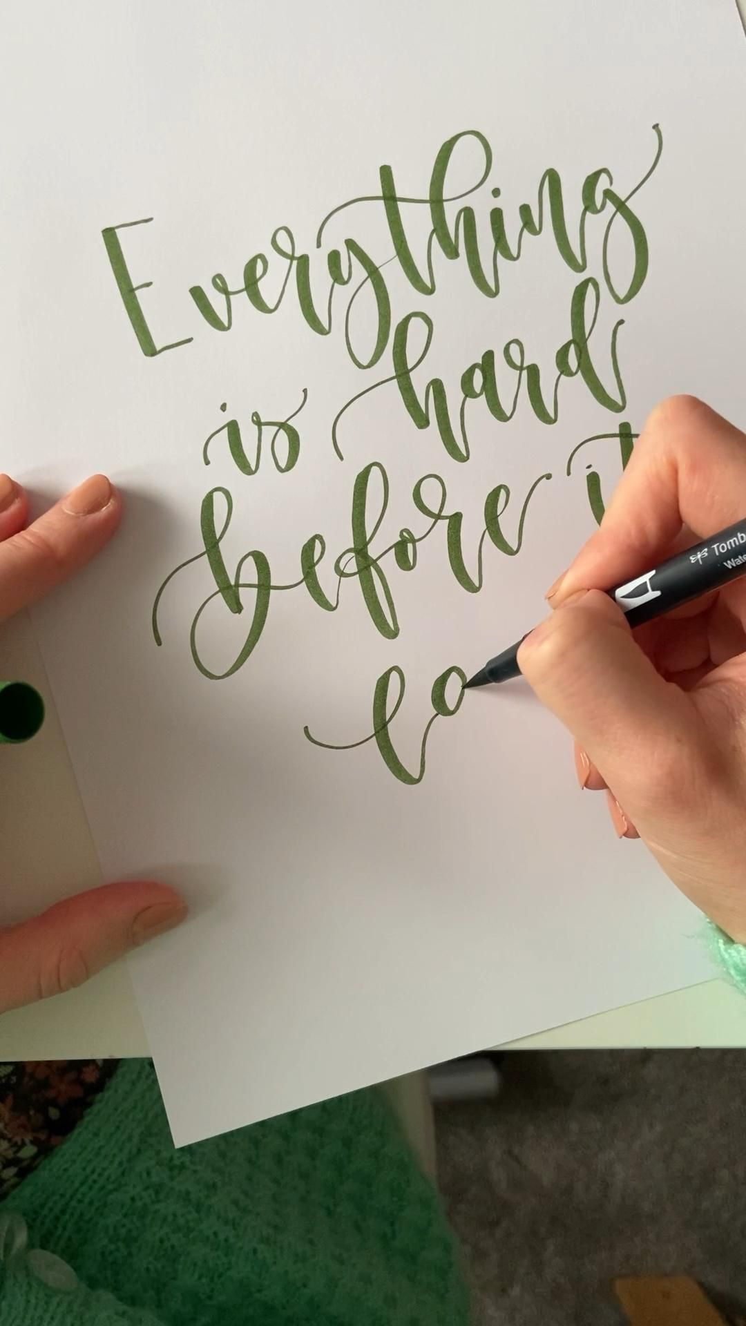 Brush lettered phrase