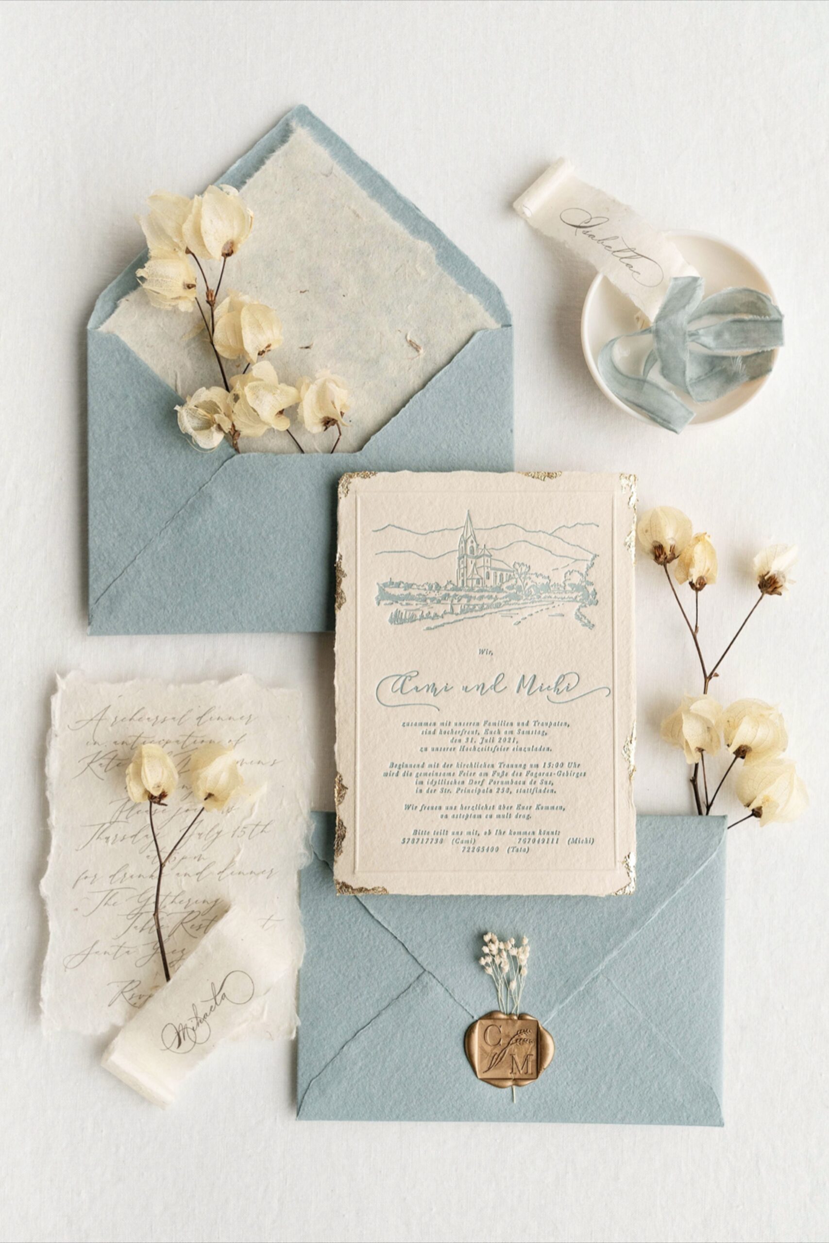 Gold leaf letterpress wedding invitation. Handmade paper envelope + custom wax seal + dried flowers