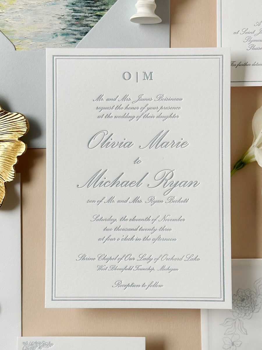 Letterpress wedding invitations with custom venue illustration