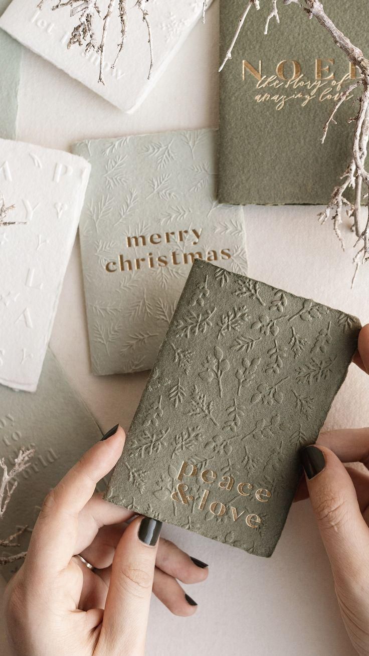 Artisanal Christmas Cards. Handmade paper greeting cards with. Blind emboss and gold foil printed