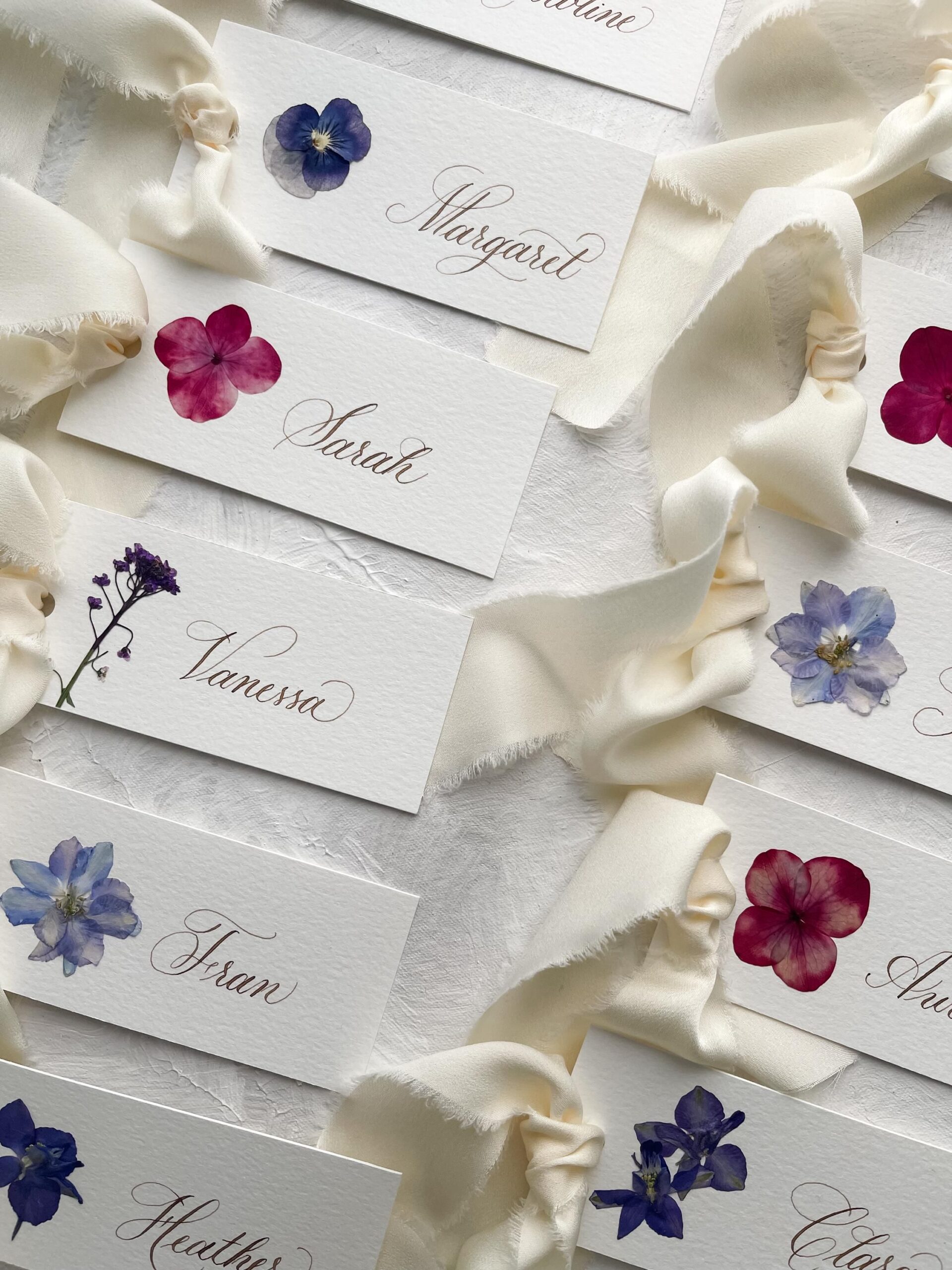 Handmade Calligraphy Place Cards with Real Pressed Flowers & Satin Ribbon | Customizable Wedding Tags, Table Settings and Event Decor